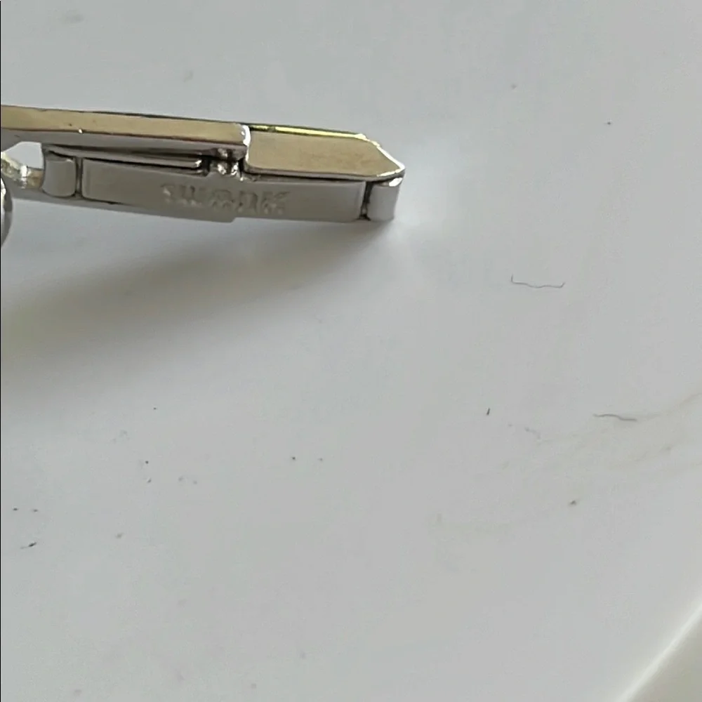 SWANK S shaped silver mesh cuff links